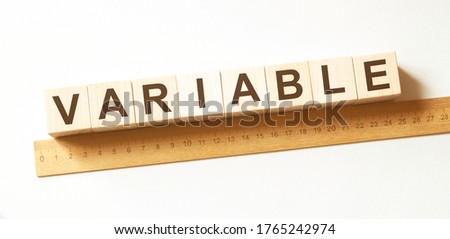 Word VARIABLE made with wood building blocks