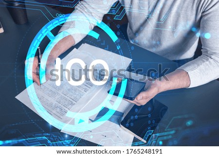 Multiexposure of man signing contract with phone and ico hologram. Concept of initial coin offering, crowd funding.