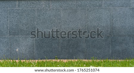 empty large marble wall with blank space for advertising banner at city street mock-up business concept