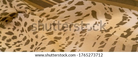 Collection of textural background, silk fabric, African theme, animal skins, brown tones.
