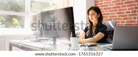 Woman At Workplace. Manager Doing Business Communication In Office Royalty-Free Stock Photo #1765316327