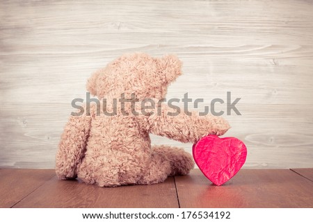 Teddy Bear with red heart shaped box Royalty-Free Stock Photo #176534192