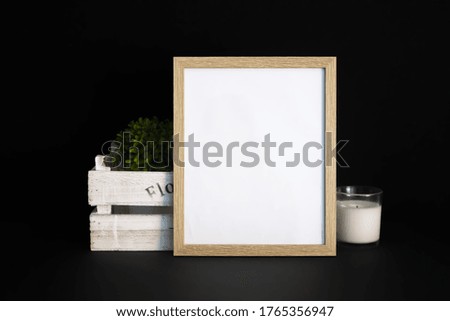 A vertical shot of a white blank frame on a black background - perfect for your text