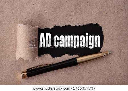 Advertising campaign, text written under torn paper. Marketing advertising targeting business strategy concept.