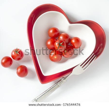 fresh tomatos cherry in a heart shape