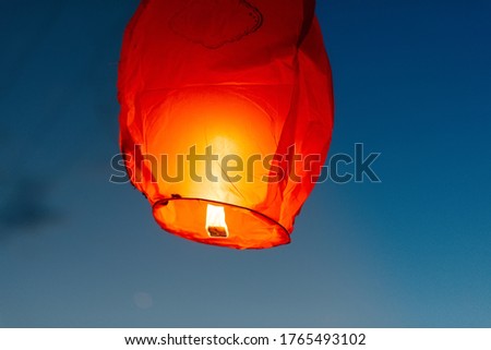 Paper lanterns launched into the sky during the celebration of traditional holidays. Traditions