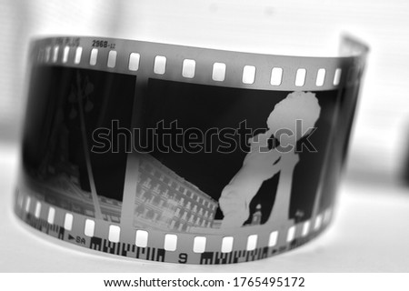 Analogue photographic film strip with a shot.