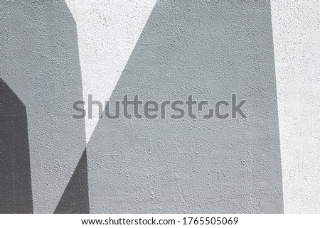 Closeup of geometric gray urban wall texture. Modern pattern for wallpaper design. Creative urban city background. Abstract open composition. Minimal geometric style, solid colors