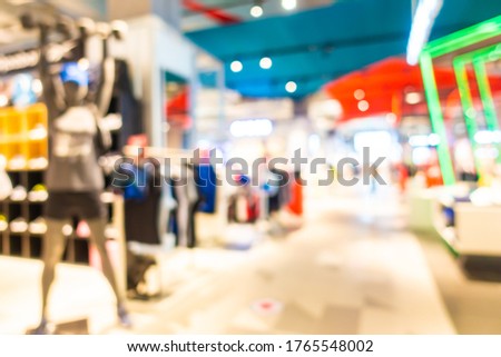 Abstract blur shopping mall and retail in department store for background