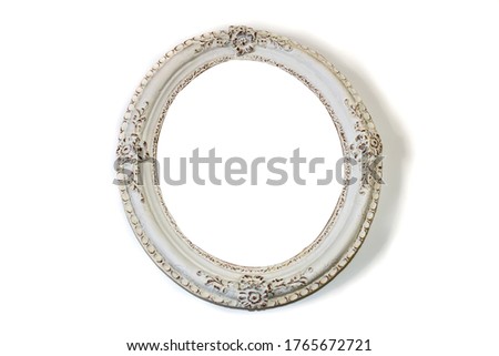 Isolated on white background closeup of vintage photo frame and mirror