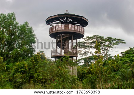 The watch tower "Raptor Tower" in Kranji Marshes. Located along the northwestern shore of Kranji Reservoir, it is one of the largest freshwater marshes in Singapore.  Royalty-Free Stock Photo #1765698398