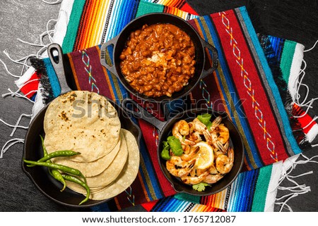 (Tortilla) bread and food from South America such as Mexico