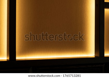 interior design element wall background texture shelf frame work with warm yellow illumination lamp lighting indoor object picture 