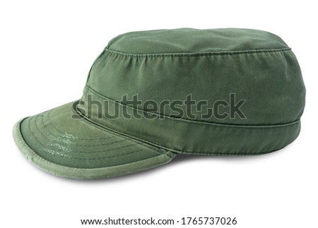 Vintage green fabric hat, isolated on white background