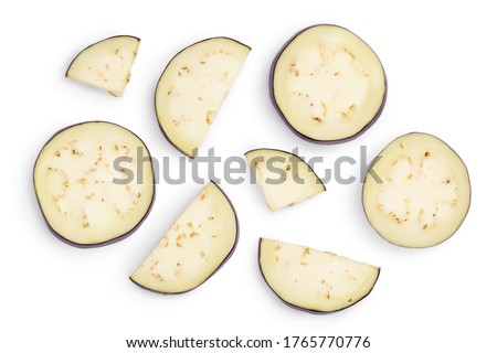 Eggplant or aubergine slices isolated on white background with clipping path and full depth of field. Top view. Flat lay. Royalty-Free Stock Photo #1765770776