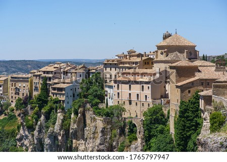 Cuenca, Castilla-La Mancha, Spain skyline seen from the top of this UNESCO World Heritage Spanish city in a sunny day.  On the right side it is the Church of San Pedro