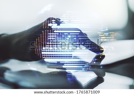 Multi exposure of abstract software development hologram with world map and finger presses on a digital tablet on background, global research and analytics concept