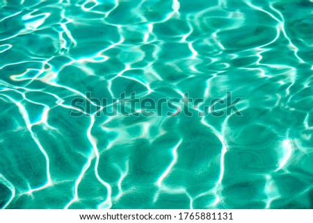 Water shadow,Pool house water texture background leafs shadows.,For making wallpapers
 Royalty-Free Stock Photo #1765881131