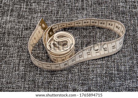 accessories for a seamstress on a gray background

