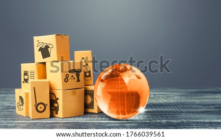 Orange glass earth globe and boxes. International world trade distribution. Delivery of goods, shipping. Globalization markets. Economics development. Global economy, import export freight traffic. Royalty-Free Stock Photo #1766039561
