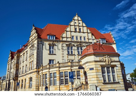 A historic, neo-Roman sandstone building in the city of Poznan
