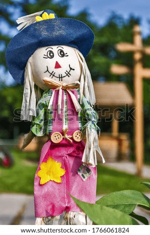 scary doll with a funny smile for Halloween