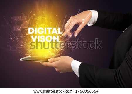 Close-up of a touchscreen with DIGITAL VISON inscription, innovative technology concept