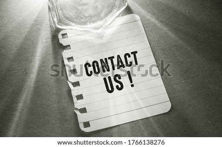Contact Us Word Written on Paper 