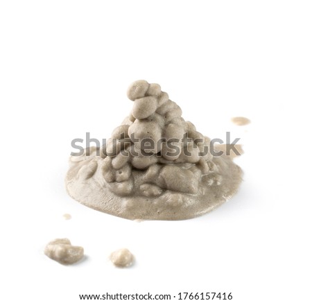 Heap of wet sea sand side view. Dripping sandy beach textured pile isolated on white background