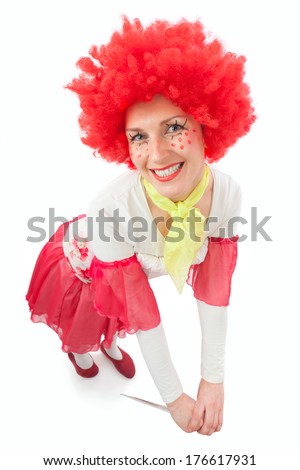 Woman clown with red hair on a white background