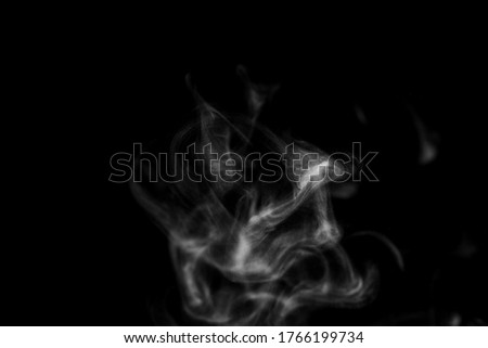 White smoke steam with swirl wave shape on isolated solid black wallpaper backgrounds use as a overlay effect for food vapor and dry ice  Royalty-Free Stock Photo #1766199734