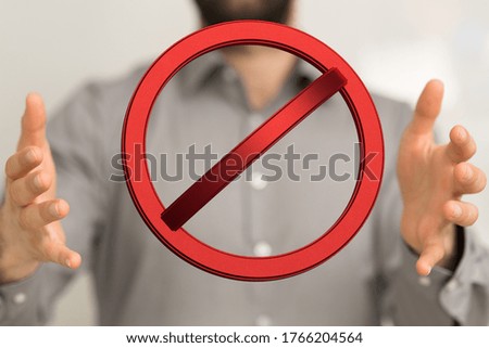The illustration of the red stop sign in the hands of a man