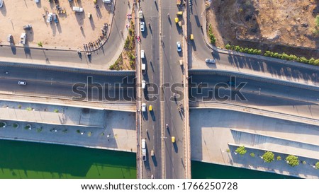 Aerial view of Ahmedabad,Gujarat/India. Riverfront and garden with skyline buildings drone view landscape. Post coronavirus covid-19 city reopens. social distancing rules after city restrictions ease. Royalty-Free Stock Photo #1766250728