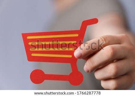 Shopping cart on digital background buying.