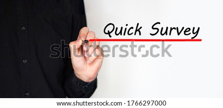 Hand writing inscription "Quick Survey" with marker, concept