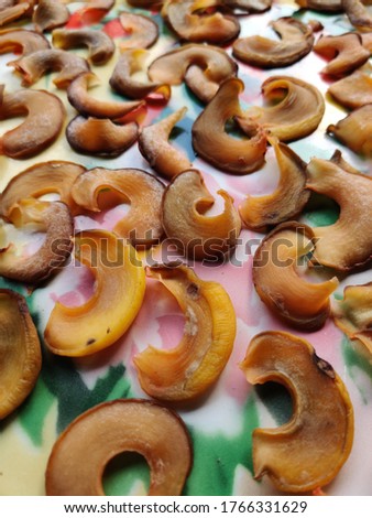 Close up of the asam keping, made from Asam Gelugor fruit, also known as Garcinia atroviridis, an important ingredient in South East Asia cuisine