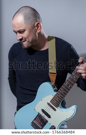 Musician guitarist with electric guitar