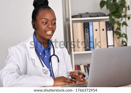 African female doctor consulting patient make online webcam video call on laptop. Black woman therapist videoconferencing in remote computer healthcare telemedicine virtual chat. Telehealth videocall. Royalty-Free Stock Photo #1766372954