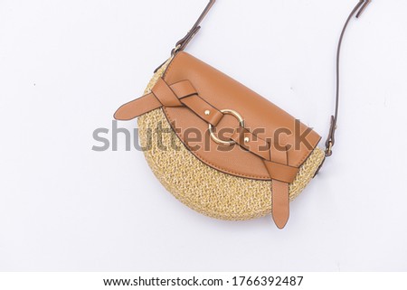 Fashion two straw handbag on white background