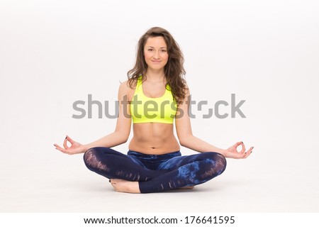 athlete young woman sitting in lotus position