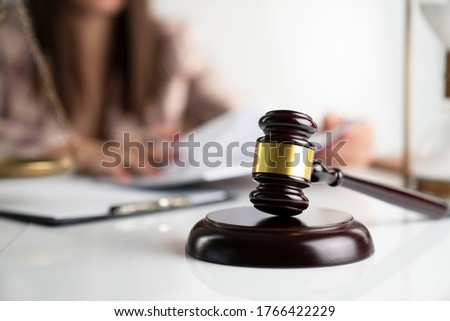 Female lawyer working in the office.