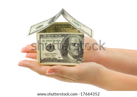 Money house in hands  isolated on white background