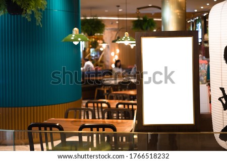 Mockup blank white screen signboard lightbox infront of japanese or chinese restaurant for your advertisement text or artwork.