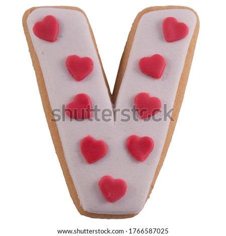 ALPHABET BAKED COOKIE WITH HEARTS LETTER V