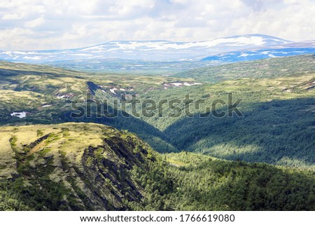 Aerial view of the mountains in the Oppdal district. The picture taken from the top of the moutain Kletten located in Innerdalen ( Innset), Norway