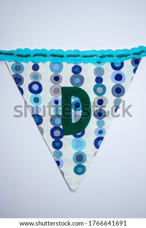 Colorful sewn triangle flag with letter for word combinations