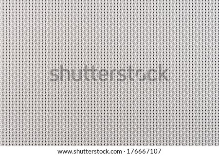 Closeup detail of grey fabric texture background.