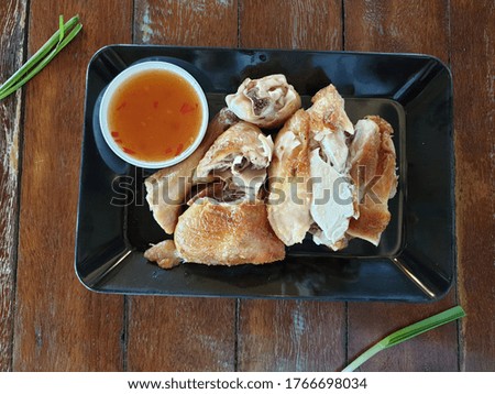Close up of picture grill chicken with sweet sause.