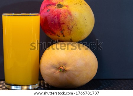 Mango juice. Fresh fruits. Exotic fruit and rich in fiber. Detox and antioxidant drink. Natural health. Refreshing drink. Tasty food. Culinary delicacy. Ingredient for desserts