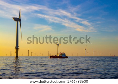 Offshore wind farm in the North Sea Royalty-Free Stock Photo #1766798630